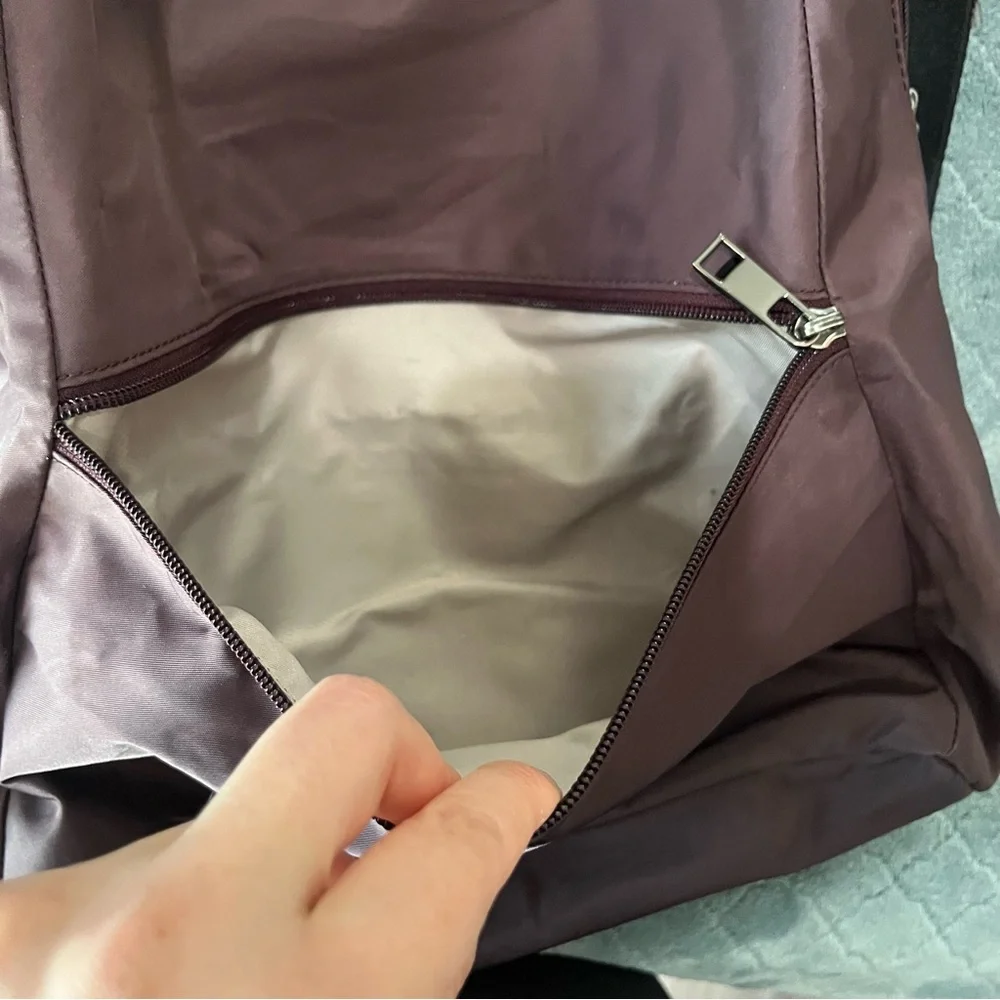 Tumi‎ maroon Backpack with Classic Design and Durable Build